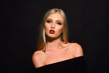 Fototapeta premium Glitter makeup, persistent lip gloss. Tempting woman with red lipstick on her lips. Blonde girl. Portrait of beautiful woman with sexy big lips with shiny red lipstick. Black Friday.
