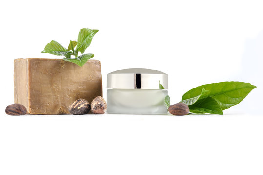 Shea Butter nuts and leave, with cosmetic products