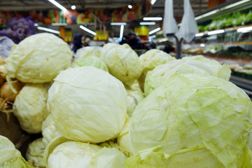 Trade vegetables in the store .cabbage at the grocery store or market.Vegetables in baskets.