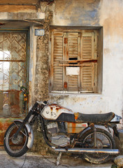 Fototapeta na wymiar Altes Motorrad, altes Haus