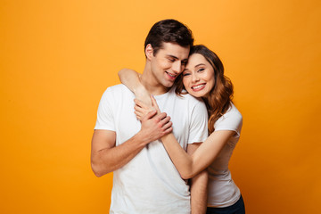 Portrait of a lovely young couple hugging