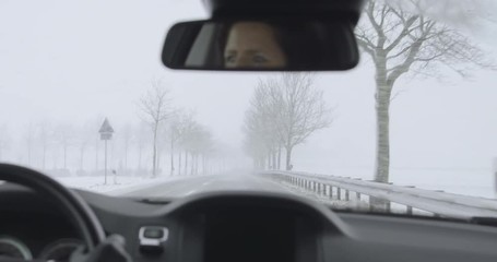 Winter Driving - driving on a country road at heavy snowfall - ProRes