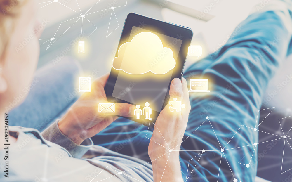 Poster cloud computing with man using a tablet in a chair