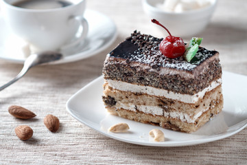 Delicious dessert cake with chocolate cream