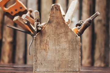 vintage tool box stand on table on wood background
