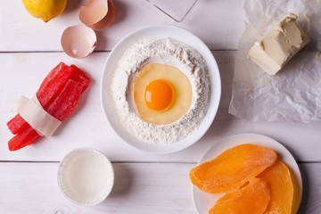 A set of ingredients for baking on a white background