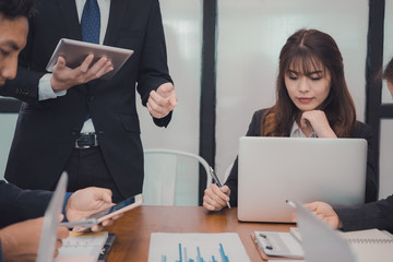 business people having meeting. businessman, businesswoman working with financial chart report. startup man & woman discussing market plan at workplace. discussion, teamwork, collaboration, corporate 