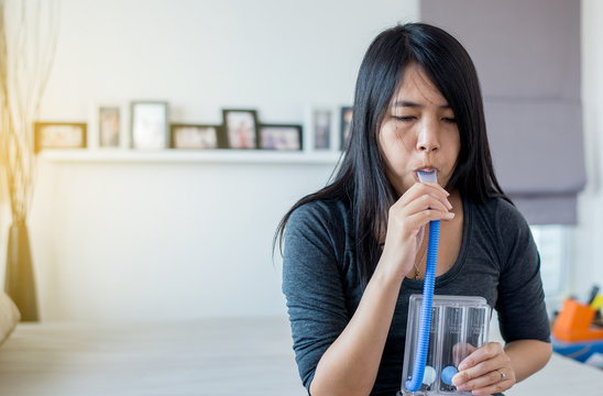 Patient using incentivespirometer or three balls for stimulate lung
