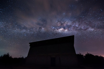 starry night sky with milky way galaxy. image contain soft focus, blur and noise due to long expose and high iso.