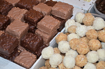 sweet pralines and pastry or candy made from chocolate and  sugar