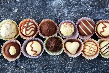 a lot of variety chocolate pralines, belgian confectionery gourmet chocolate.