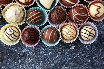 a lot of variety chocolate pralines, belgian confectionery gourmet chocolate.