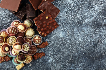 Obraz na płótnie Canvas a lot of variety chocolate pralines, belgian confectionery gourmet chocolate.