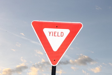 yield sign and blue sky