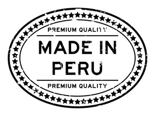 Grunge black premium quality made in Peru oval rubber seal stamp on white background