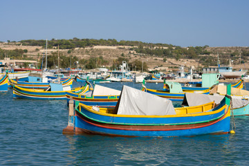 Fototapeta na wymiar Colorful Boats In Harbor, Malta