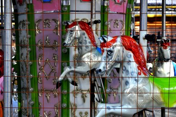 a horse on a children's merry-go-round