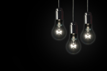 Light bulbs on black background