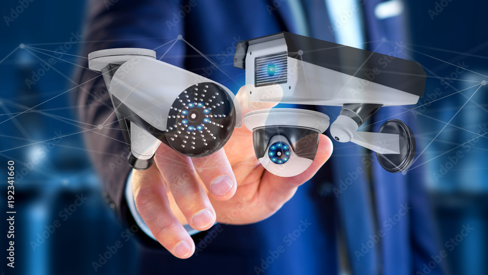 Poster businessman holding a security camera system and network connection - 3d rendering
