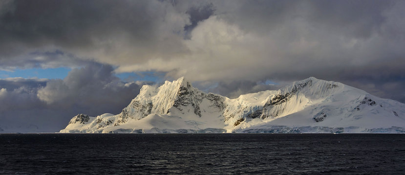 Antarctic landscape with mountains view from sea panoramic