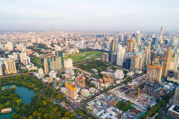 Fototapeta na wymiar Modern city downtown of Bangkok with green public park