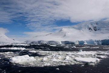 Antarctic landscape with sea and mountains