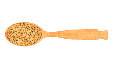Seeds fenugreek in spoon