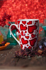 Romantic gift for the beloved for Valentine's Day all lovers holiday hot tea hibiscus in a mug with hearts