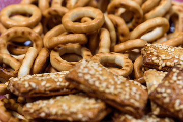 biscuits with sesame seeds and small bagels photographed macro