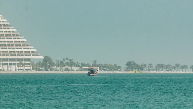 A dhow going to harbour in Doha timelapse, Qatar