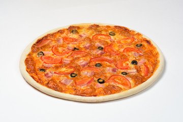Pizza with tomatoes, ham, cheese and olives on a white sauce on a white background
