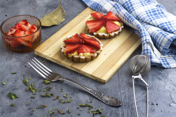delicious homemade arabic strawberry tartlet on cutting board