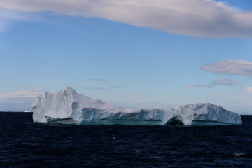 Antarctic landscape with iceberg