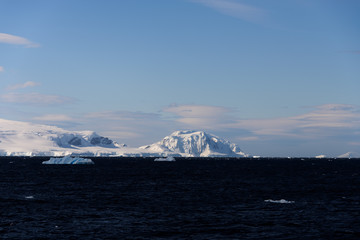 Antarctic landscape with iceberg