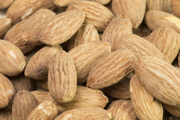 Peeled almonds closeup. For vegetarians. 