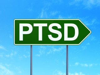 Healthcare concept: PTSD on green road highway sign, clear blue sky background, 3D rendering