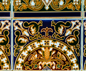 Traditional ornamental Spanish decorative tiles, original ceramic tiles on the walls of buildings