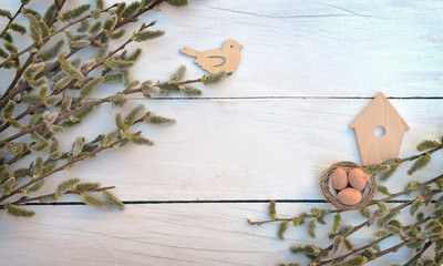 Branches on old wooden boards. Top view. A symbol of the rebirth of nature.