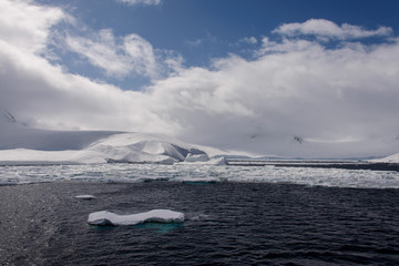 Antarctic landscape with sea and mountains