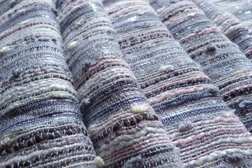 gray antique fabric close-up with pink and shiny threads rough wallpaper for decoration backdrop for design stripes boucle cotton linen upholstery natural material pattern texture