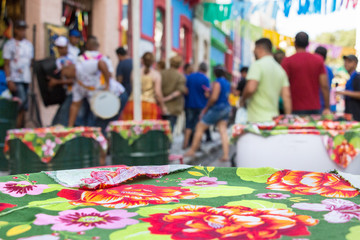 A bar table with colorful tablecloth, Brazil.