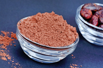 Cacao powder and beans in a bowls