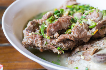 hot and spicy pork rib hot pot with thai herbs in restaurant. Thai food concept.