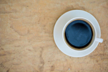Black coffee in white cup