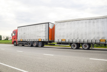 Obraz na płótnie Canvas Freight vehicles on the track. Freight car. Truck.