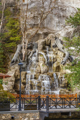 Fototapeta na wymiar Artificial waterfall in Borjomi, Georgia