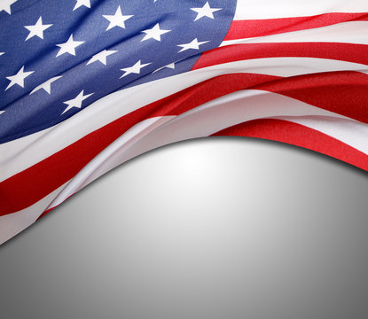 USA flag on grey. Copy space
