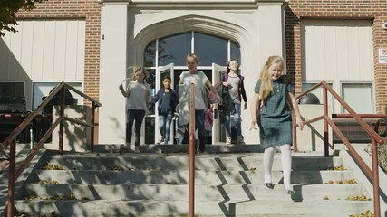 Students exiting school and descending staircase / Provo, Utah, United States