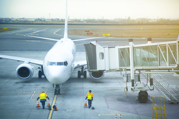 Airplane near the terminal in an airport