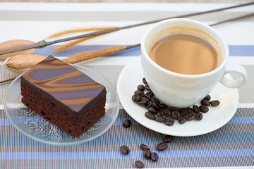 A cup of coffee and Chocolate cake